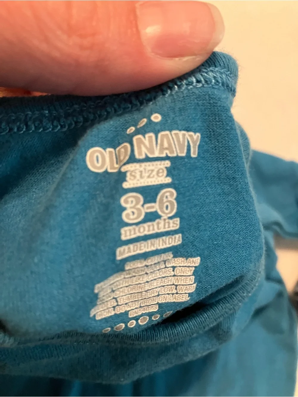 Teal Infant Long Sleeve Bodysuit and Dark Wash Jeans